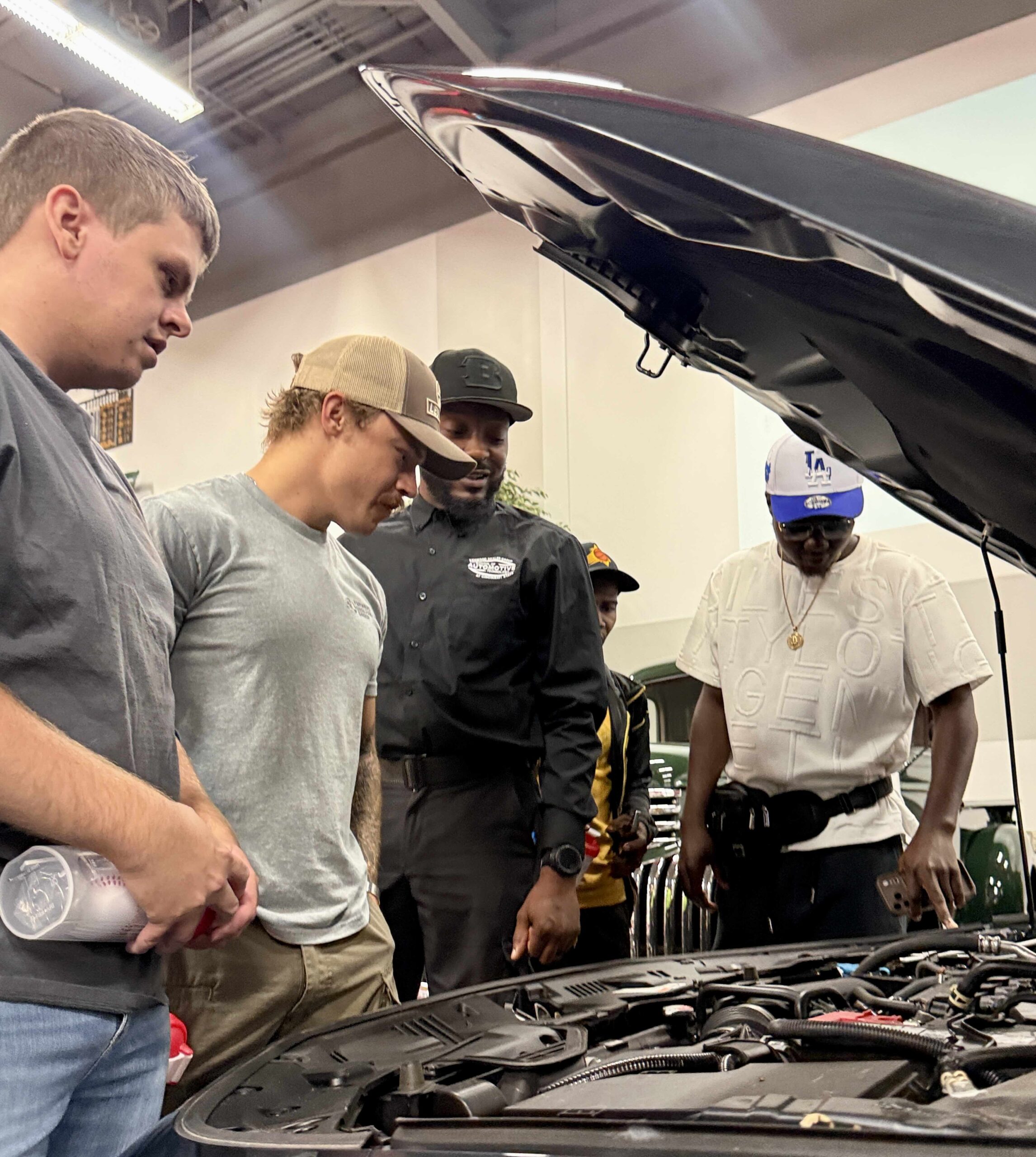 Automotive students checked out the new car
